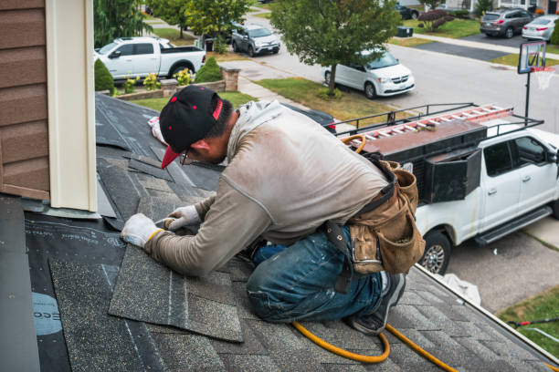 Professional Flat Roof Repair technician working in Newburg, WI